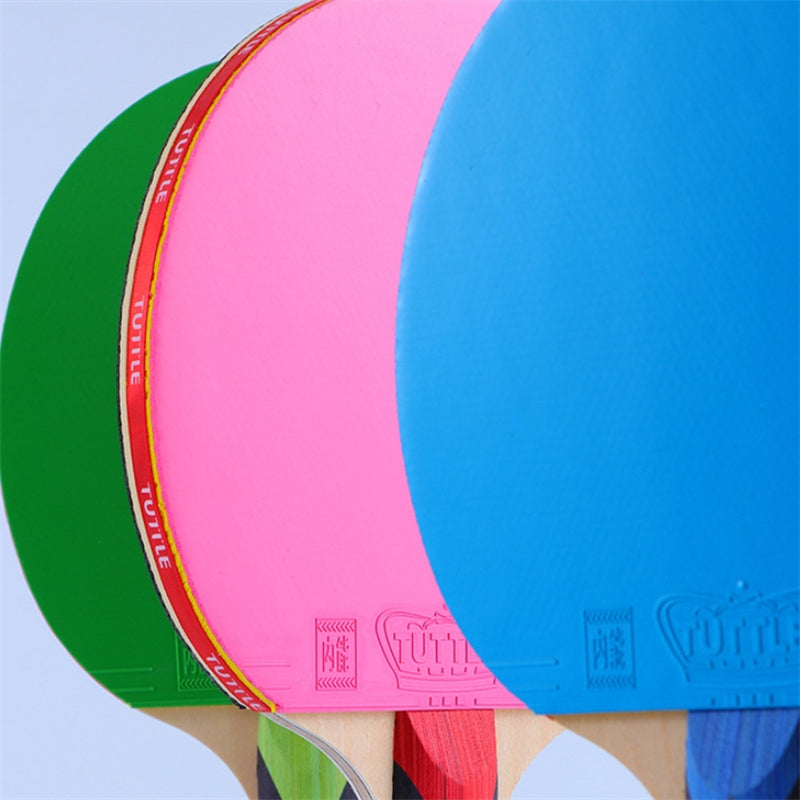 Raquette ping pong bleue rose verte